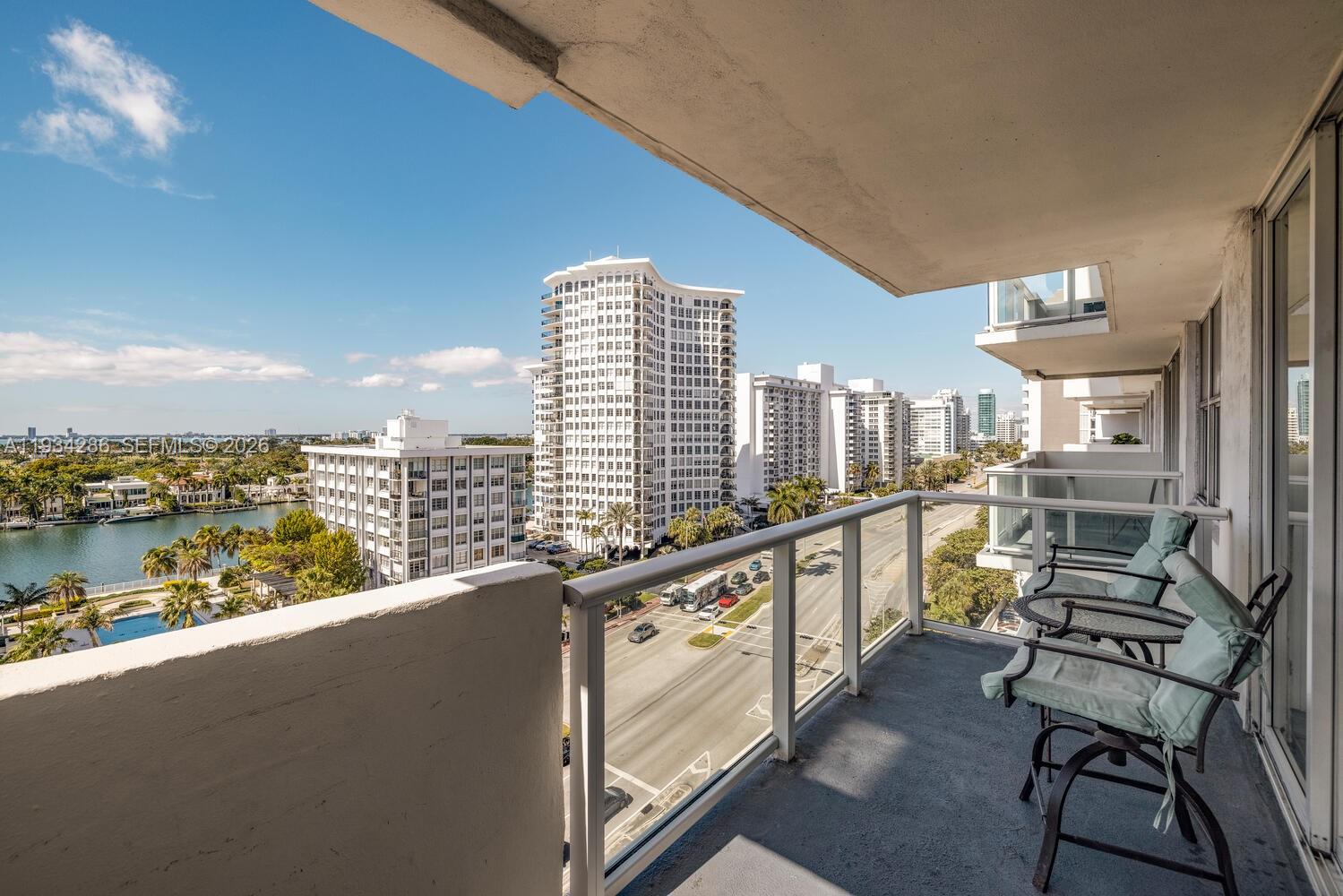 5601 Collins Avenue, Unit 1019 Miami Beach, FL 33140 - Photo 12 of 29 a view of balcony with furniture and city view