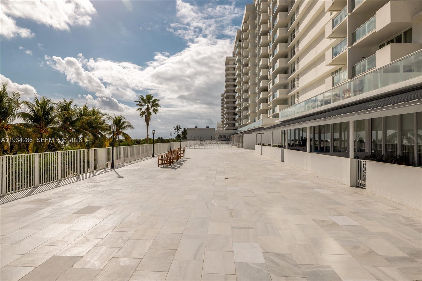 5601 Collins Avenue, Unit 1019 Miami Beach, FL 33140 - Photo 7 of 29 a view of swimming pool with a yard