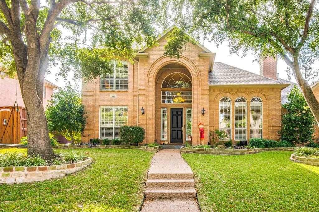 343 Tanglewood Lane Coppell, TX 75019 - Photo 1 of 1 front view of a house with a yard