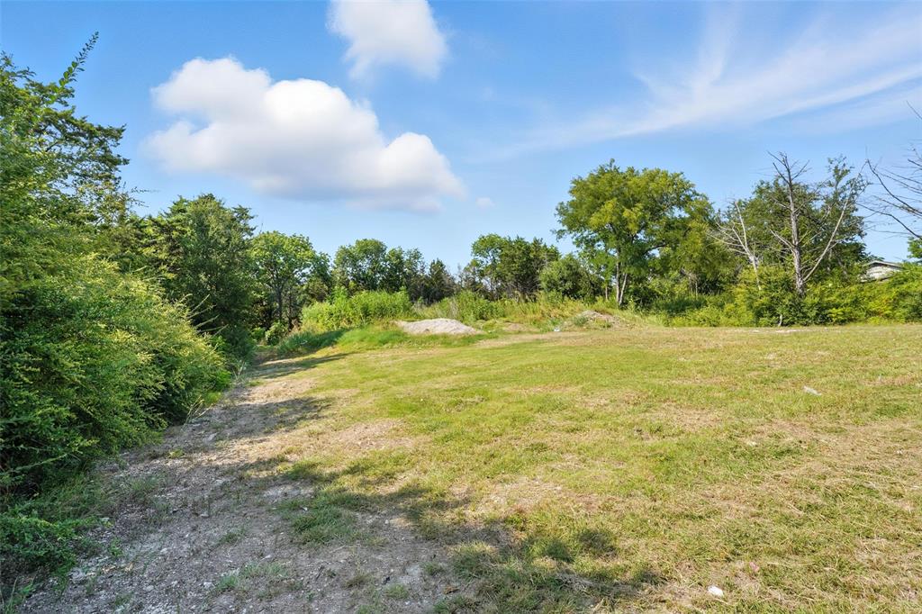 3001 Simpson Stuart Road Dallas, TX 75241 - Photo 15 of 23 a view of a field with an trees