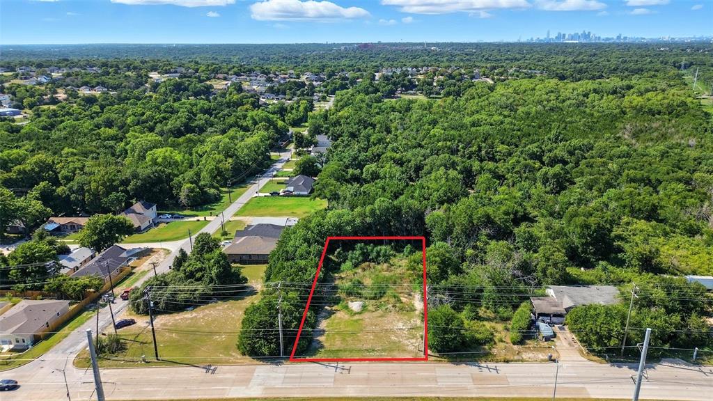 3001 Simpson Stuart Road Dallas, TX 75241 - Photo 2 of 23 an aerial view of a house with a yard and lake view