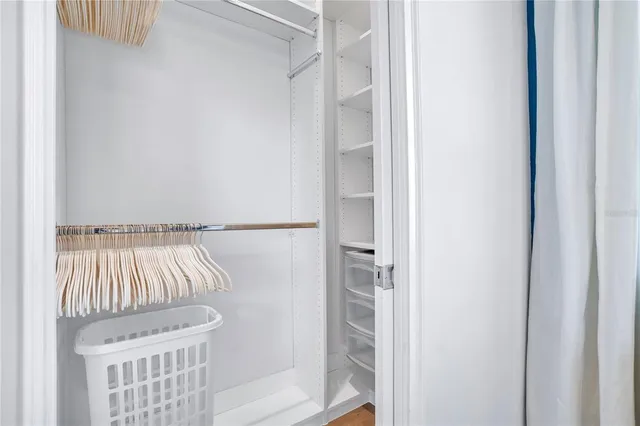 a bathroom with a window and shower