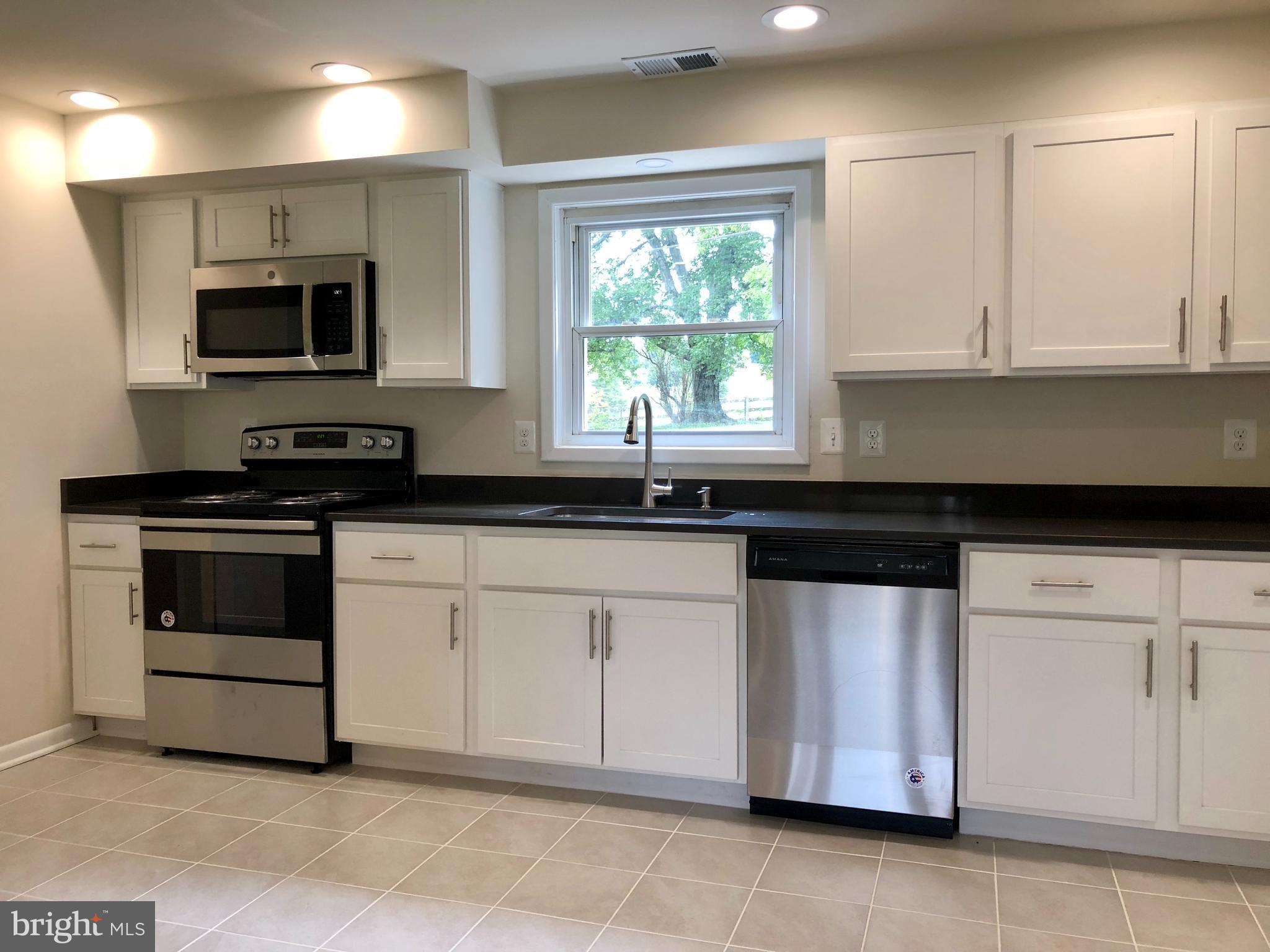 4509 Baker Valley Road Frederick, MD 21704 - Photo 2 of 17 DESIGNER KITCHEN WITH NEW CABINETS & QUARTZ