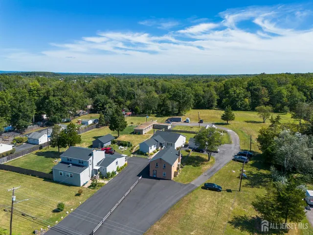 a picture of a city with lots of palm trees