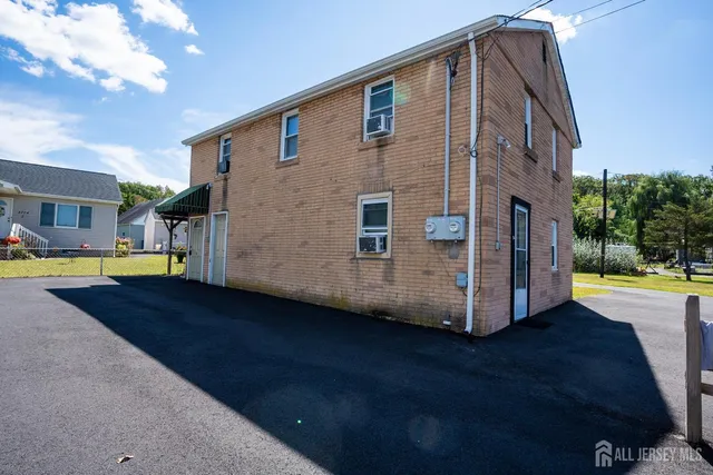 a view of a house with a swimming pool