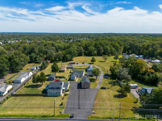 an aerial view of a house with a garden