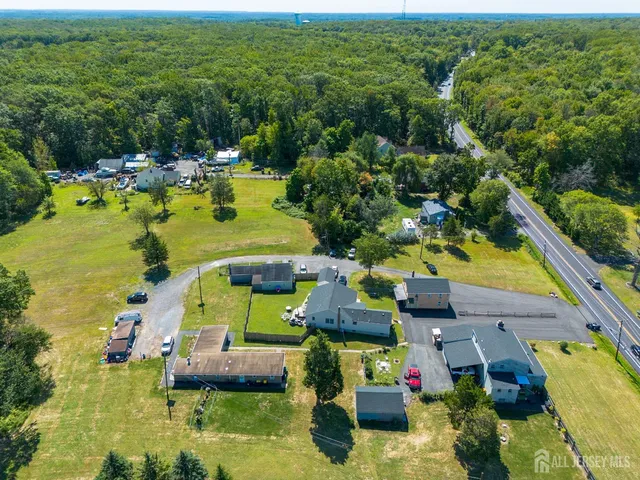 a view of a swimming pool with a yard