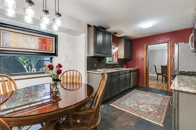 a kitchen with granite countertop lots of counter top space