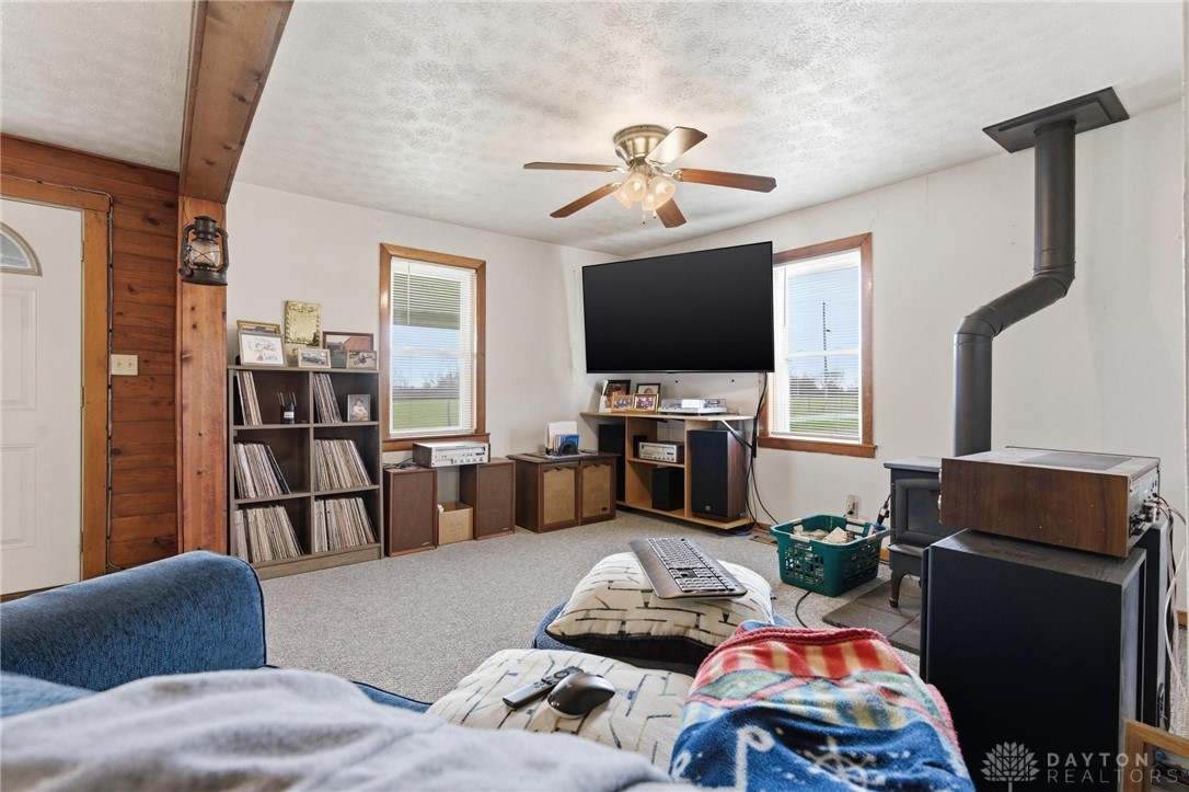11379 Friend Road Germantown, OH 45327 - Photo 12 of 44 This inviting room features warm wood accents and abundant natural light.