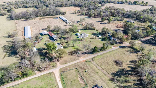 a view of a backyard of a house