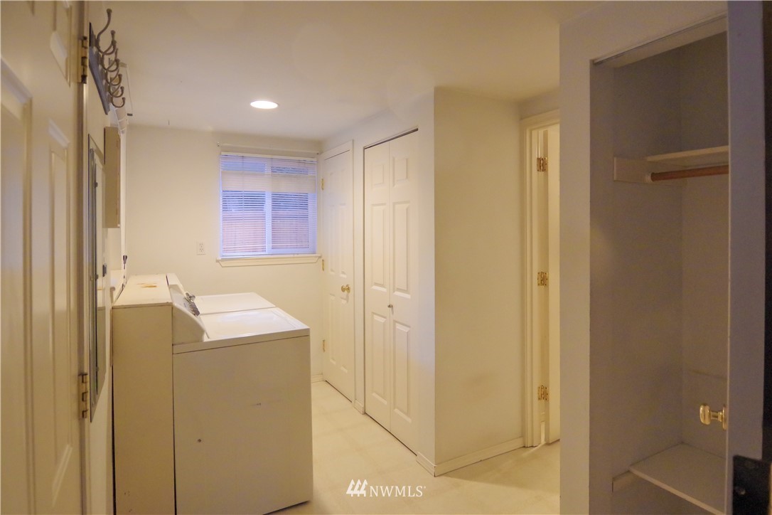 22028 9th Avenue Southeast Bothell, WA 98021 - Photo 16 of 16 a bathroom with a sink mirror and shower