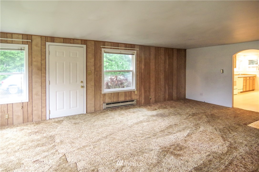 22028 9th Avenue Southeast Bothell, WA 98021 - Photo 5 of 16 an empty room with windows