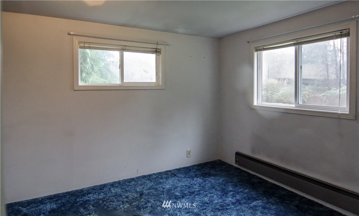 22028 9th Avenue Southeast Bothell, WA 98021 - Photo 10 of 16 a room with a window