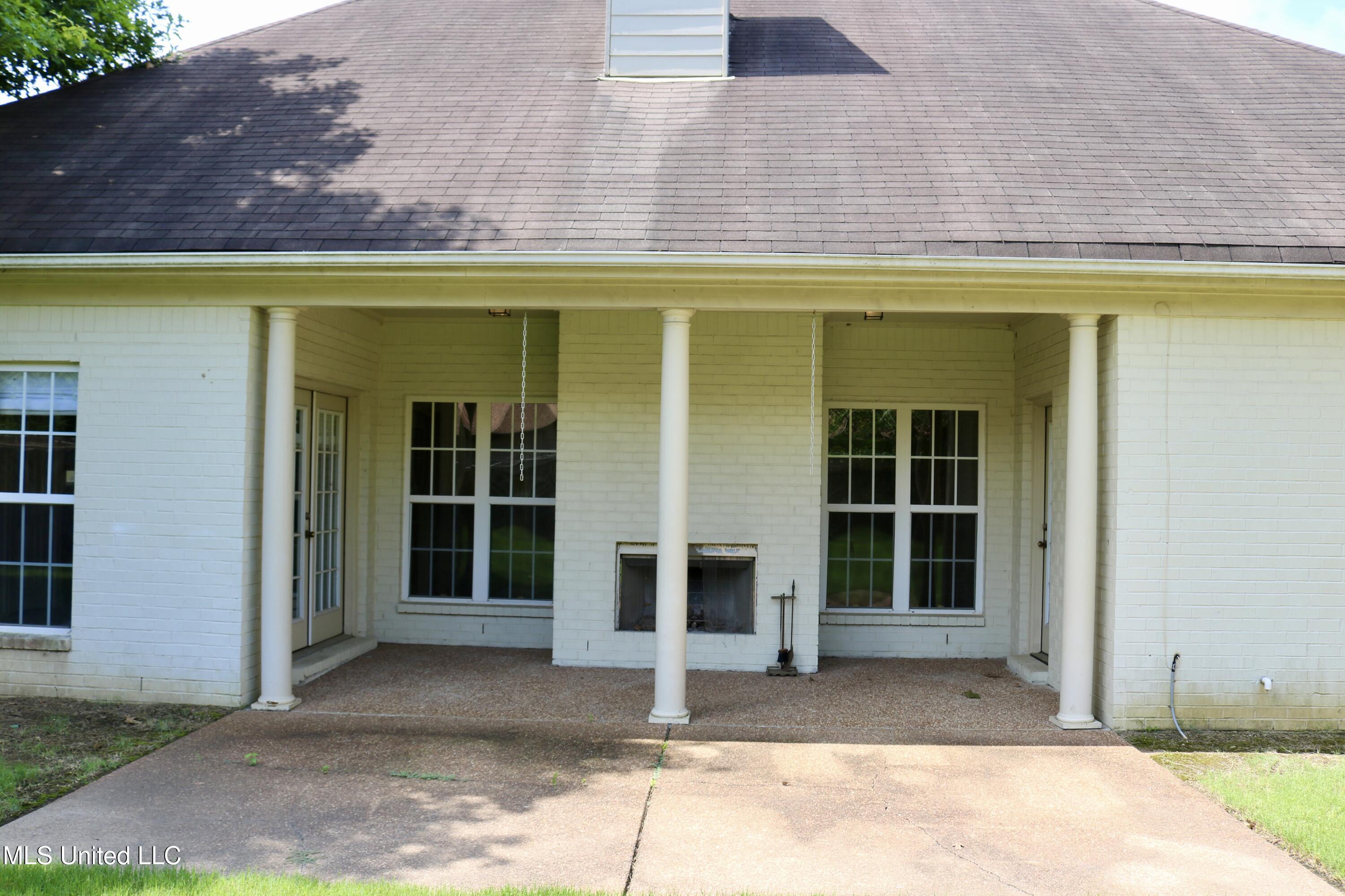 860 Cedar Grove Parkway Hernando, MS 38632 - Photo 55 of 62 Covered patio with fireplace