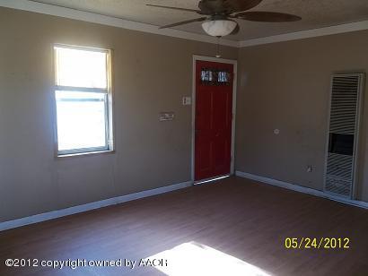 4600 South Travis Street Amarillo, TX 79110 - Photo 3 of 3 an empty room with a window