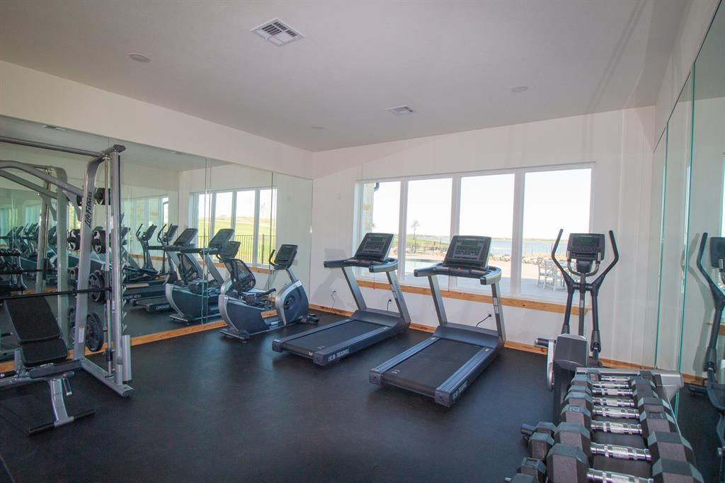 Tbd Tbd Shoreside Drive Corsicana, TX 75109 - Photo 18 of 21 a living room with furniture gym equipment and a large window