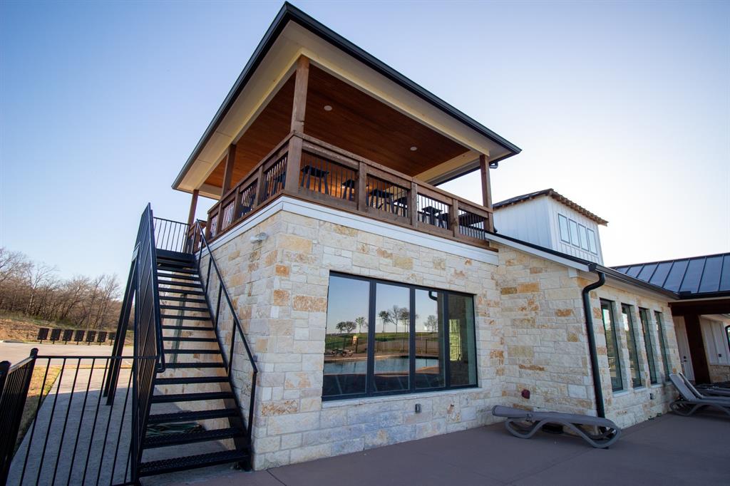 Tbd Tbd Shoreside Drive Corsicana, TX 75109 - Photo 19 of 21 a view of a house with stairs and wooden floor