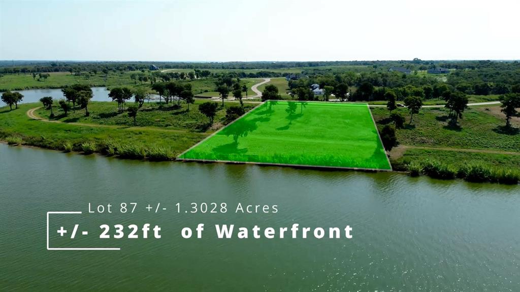 Tbd Tbd Shoreside Drive Corsicana, TX 75109 - Photo 2 of 21 a view of a lake with a building in the background