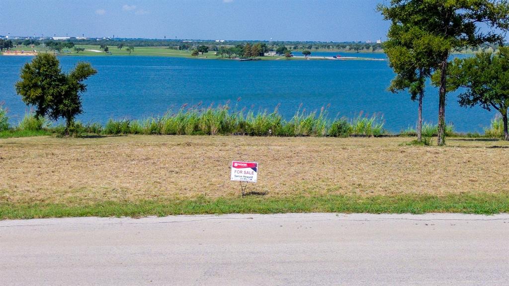 Tbd Tbd Shoreside Drive Corsicana, TX 75109 - Photo 21 of 21 a view of a lake with a yard and large trees