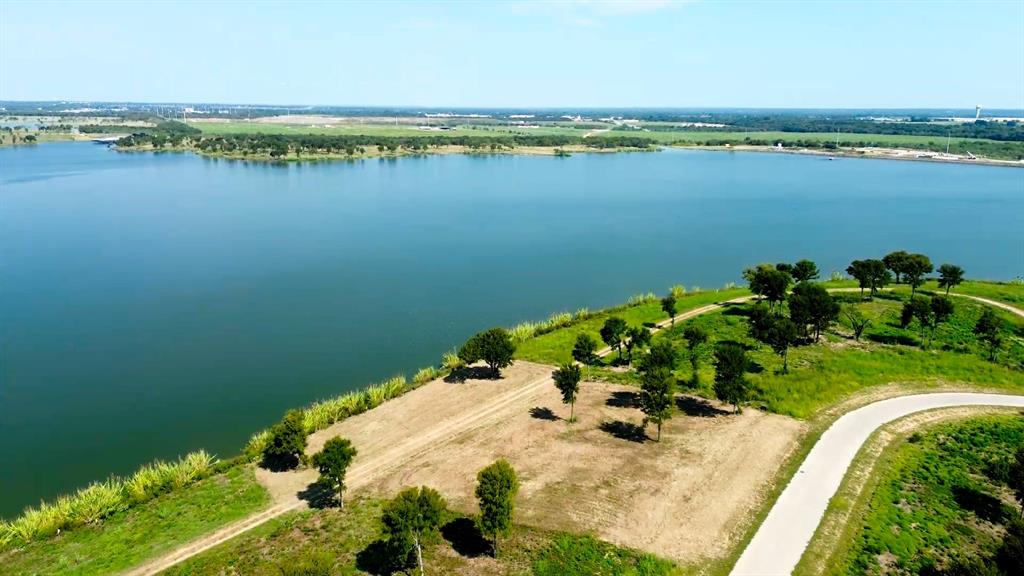 Tbd Tbd Shoreside Drive Corsicana, TX 75109 - Photo 4 of 21 a view of a lake with a beach