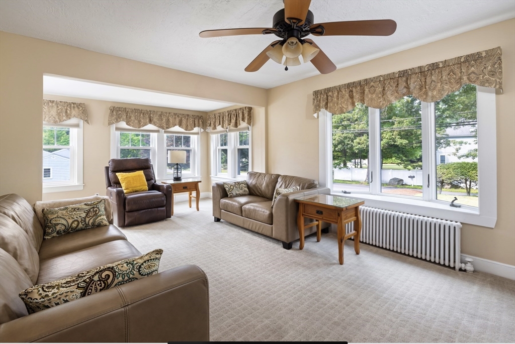 30 Olive Street Ashland, MA 01721 - Photo 5 of 9 a living room with furniture and a large window