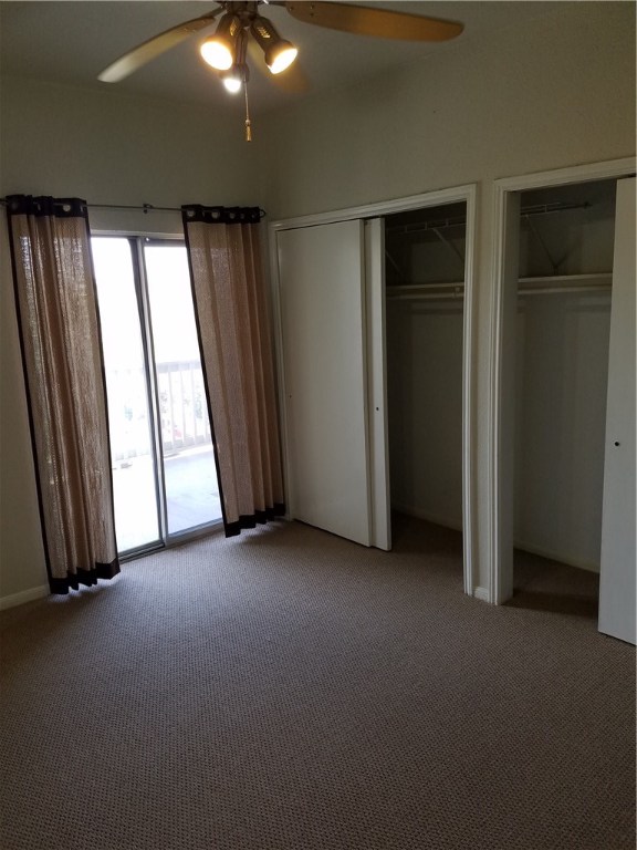 2450 Wickersham Lane, Unit 1317 Austin, TX 78741 - Photo 11 of 20 an empty room with windows