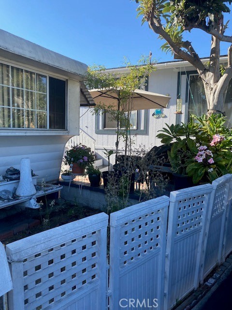 2767 West 1st Street, Unit 26 Santa Ana, CA 92703 - Photo 1 of 15 a front view of a house