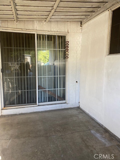 2767 West 1st Street, Unit 26 Santa Ana, CA 92703 - Photo 12 of 15 a view of an empty room with a window