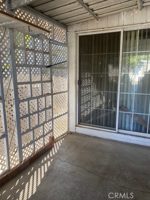 2767 West 1st Street, Unit 26 Santa Ana, CA 92703 - Photo 13 of 15 a view of empty room with floor to ceiling window