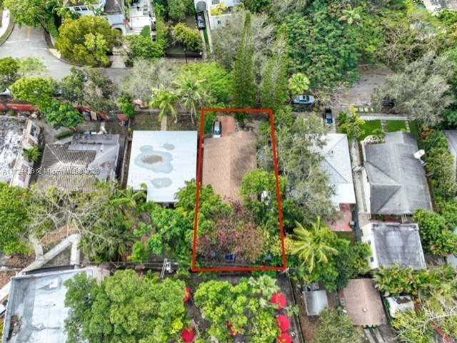 133 Northeast 48th Street Miami, FL 33137 - Photo 14 of 32 an aerial view of a house with a yard and garden