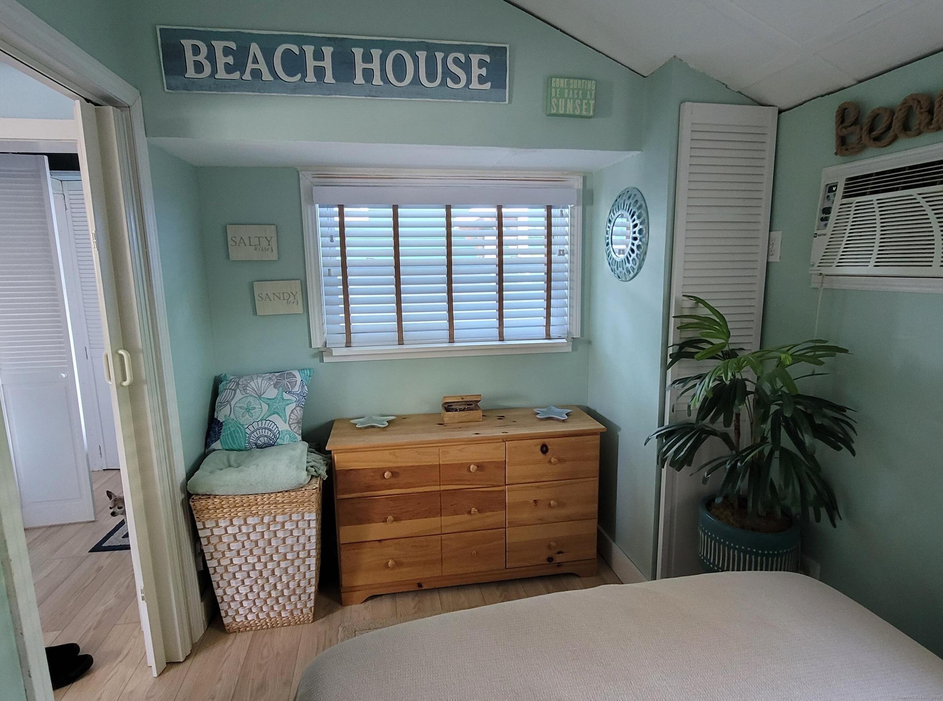 7 3rd Street Madison, CT 06443 - Photo 7 of 23 a room with furniture and a window