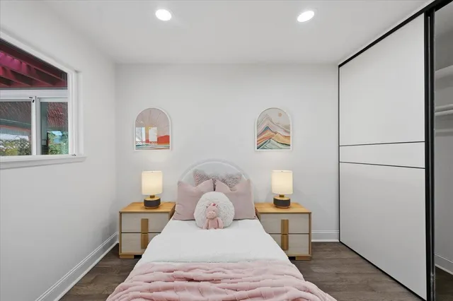 a view of a house with a yard and plants