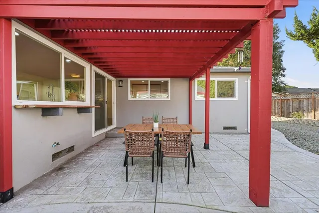 a view of empty room with wooden walls