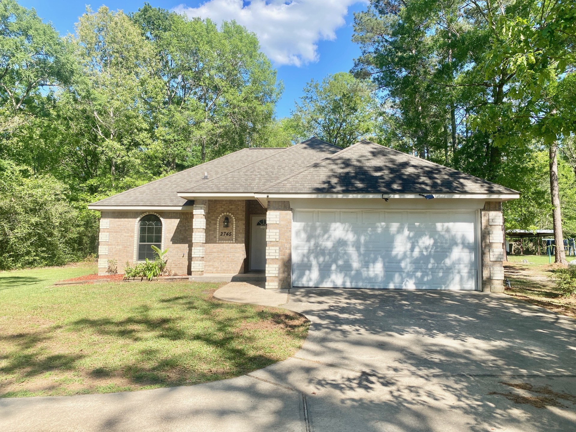 2745 Bethlehem Road Lufkin, TX 75904 - Photo 1 of 14 a front view of a house with a yard