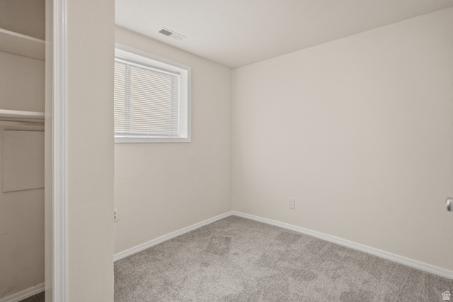 337 North Main Street Central Valley, UT 84754 - Photo 35 of 40 Unfurnished bedroom featuring light colored carpet and baseboards