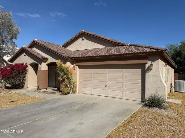 a view of a house with a garage