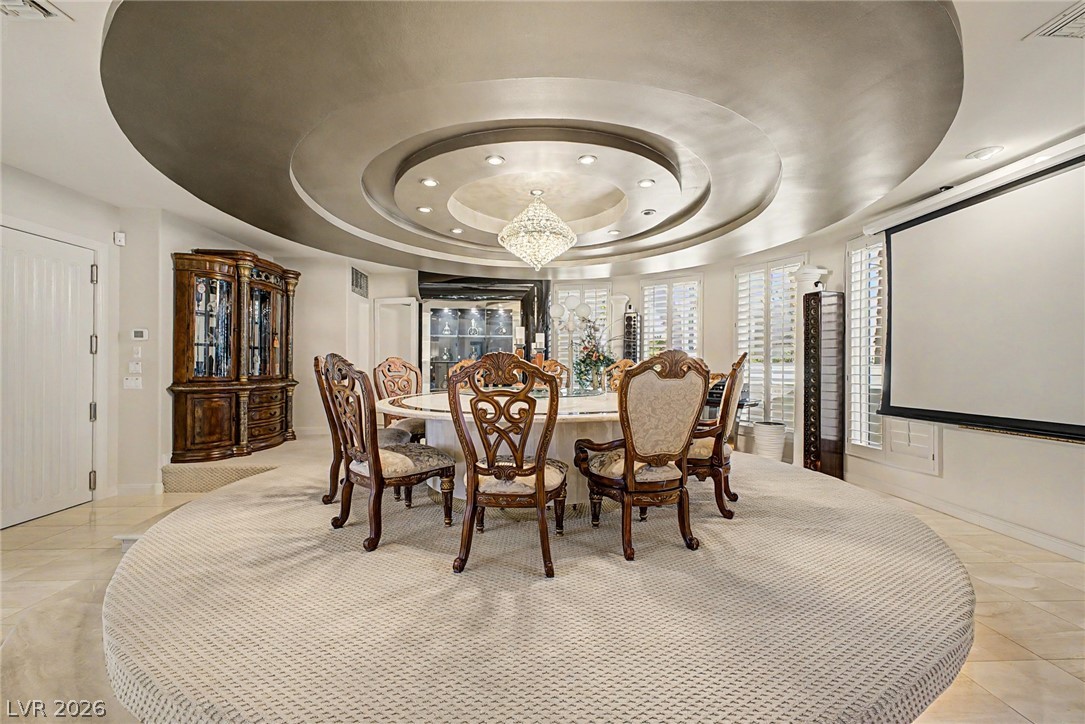 46 Gulf Stream Court Las Vegas, NV 89113 - Photo 14 of 62 This dining room offers an elegant setting for gatherings, highlighted by architectural details and ample natural light.