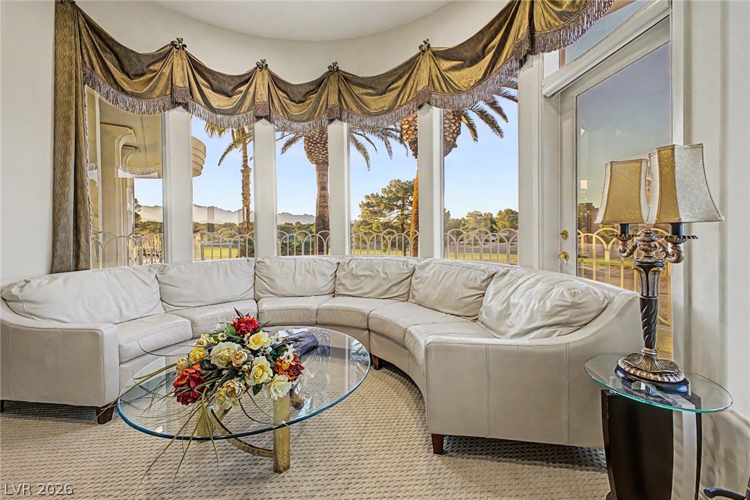 46 Gulf Stream Court Las Vegas, NV 89113 - Photo 37 of 62 This bright living space offers abundant natural light and scenic views through expansive windows.