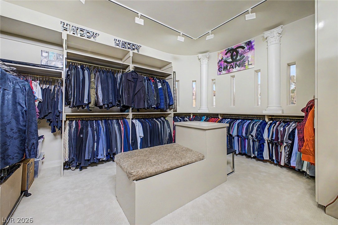 46 Gulf Stream Court Las Vegas, NV 89113 - Photo 41 of 62 This custom closet offers ample storage with convenient built-in shelving.
