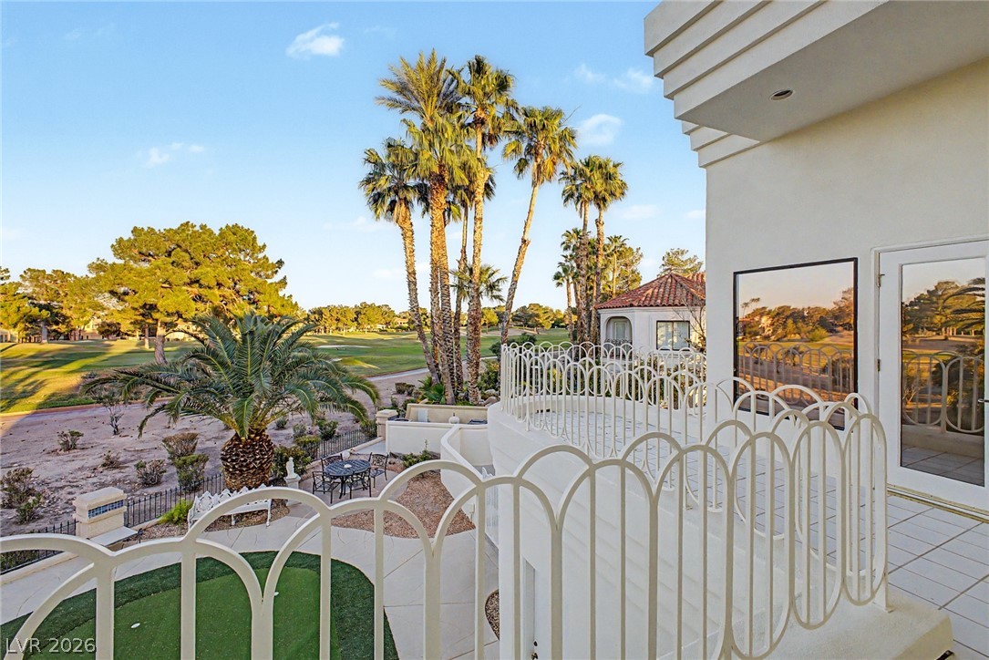 46 Gulf Stream Court Las Vegas, NV 89113 - Photo 55 of 62 This exquisite outdoor area offers panoramic golf course views and elegant balcony railings.