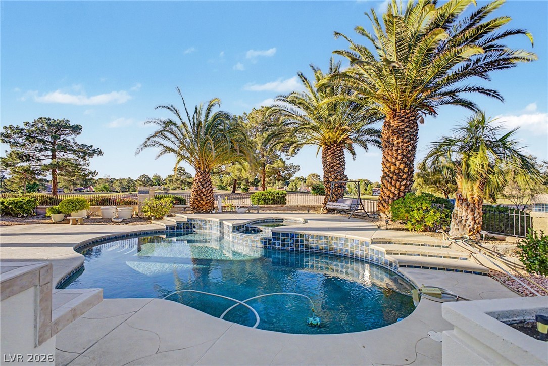 46 Gulf Stream Court Las Vegas, NV 89113 - Photo 60 of 62 Relax poolside in this tranquil outdoor retreat, complete with lush landscaping and serene surroundings.