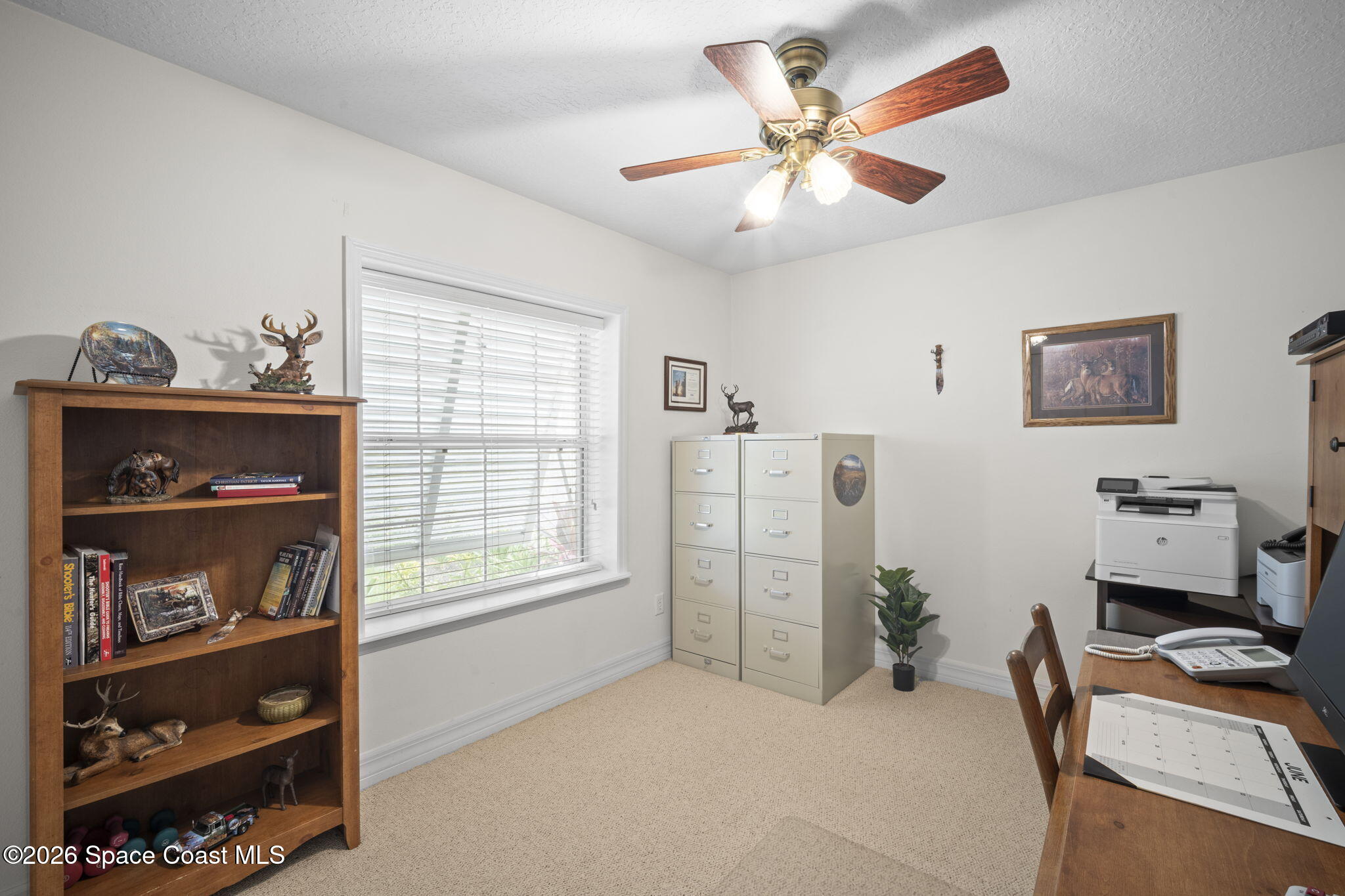 3125 Davis Road Mims, FL 32754 - Photo 7 of 47 a bedroom with furniture and a window