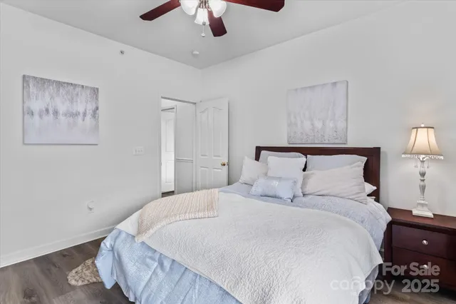 a bed room with a bed and a lamp