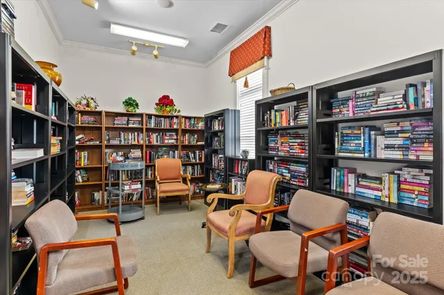 a living room with furniture fireplace and flat screen tv