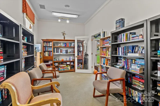 a living room with furniture flat screen tv and a fireplace