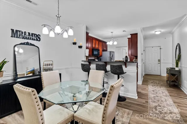 a view of a dining room with furniture