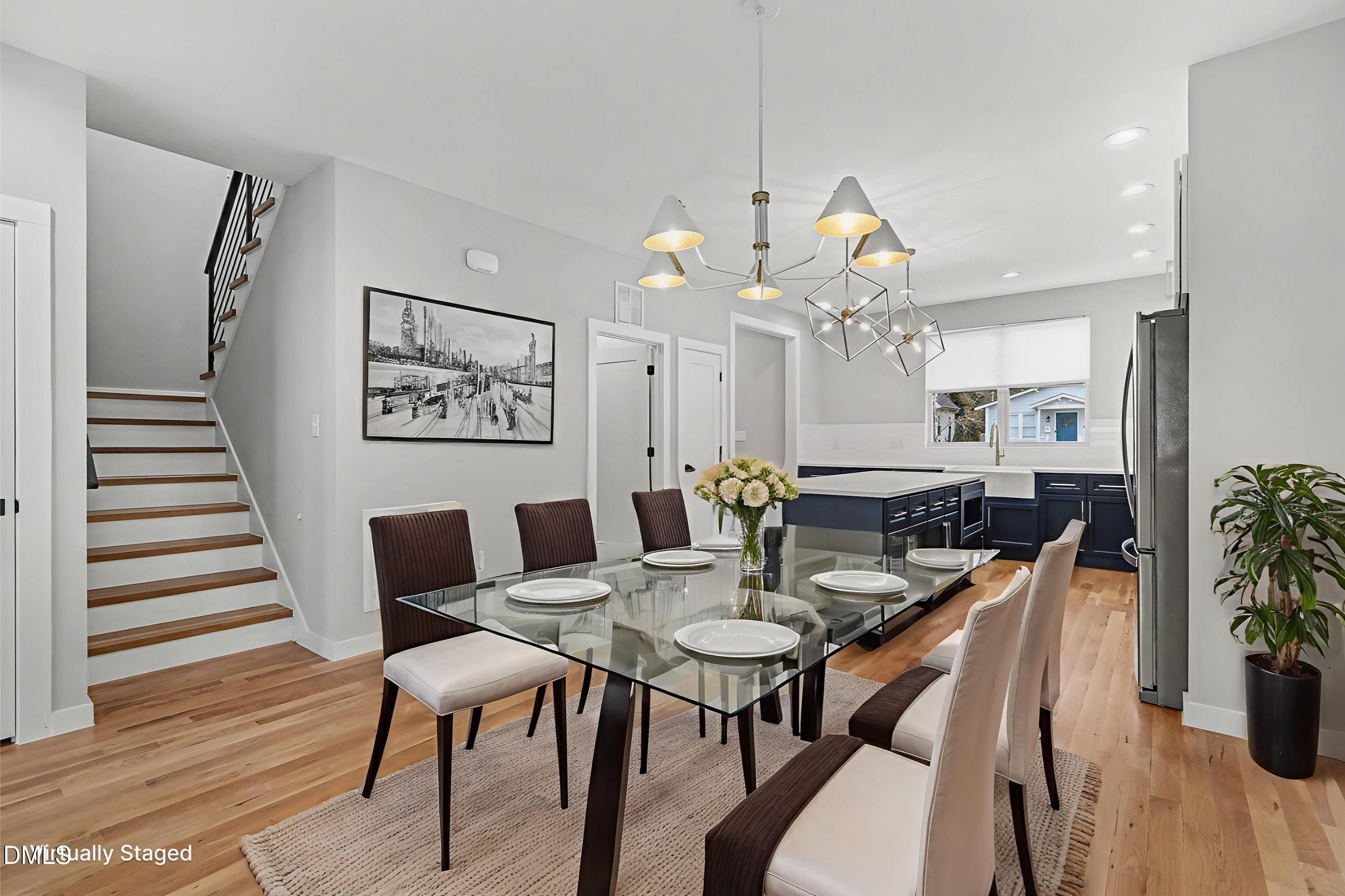 1508 East Jones Street Raleigh, NC 27610 - Photo 12 of 38 a view of a dining room with furniture and wooden floor