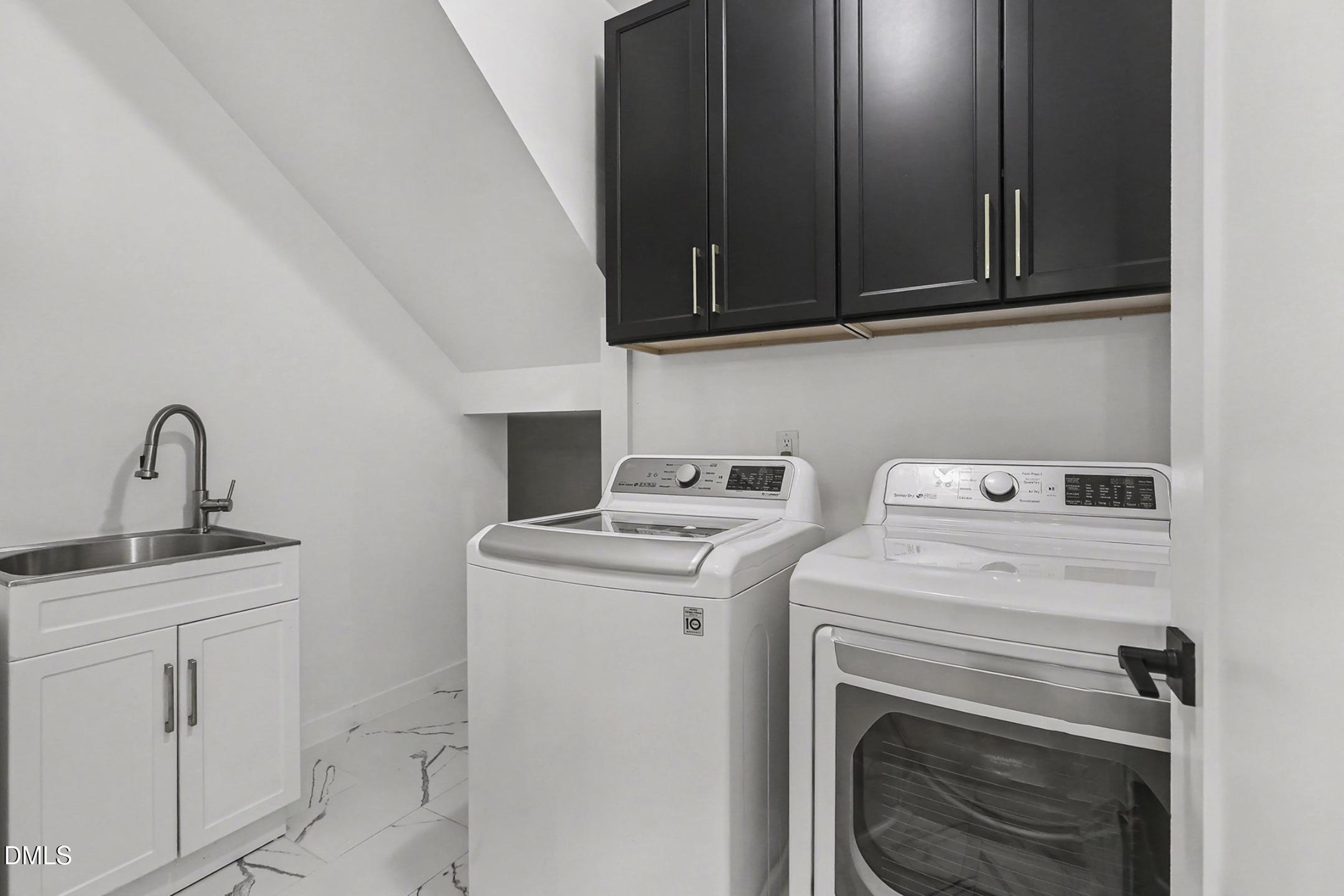 1508 East Jones Street Raleigh, NC 27610 - Photo 18 of 38 a utility room with dryer and washer