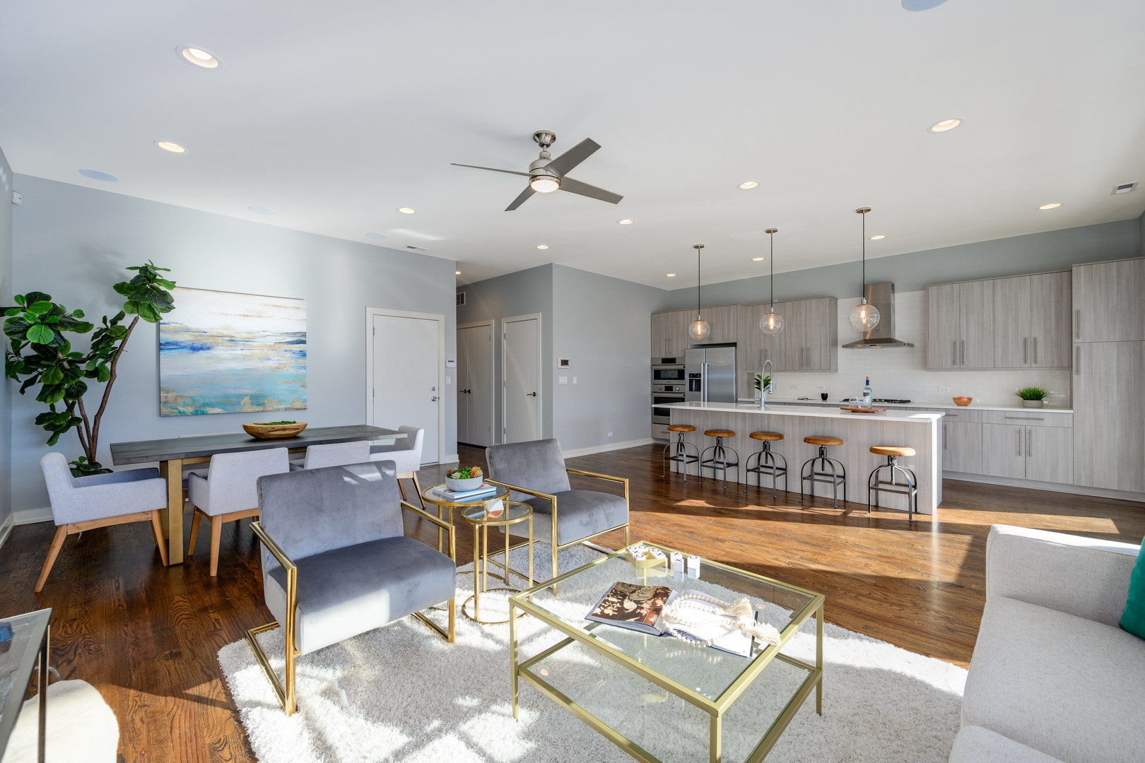 1832 West Rice Street, Unit 2 Chicago, IL 60622 - Photo 12 of 29 a living room with lots of furniture and kitchen view