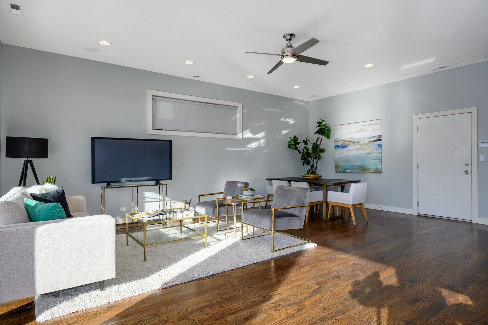 1832 West Rice Street, Unit 2 Chicago, IL 60622 - Photo 13 of 29 a living room with furniture and a flat screen tv